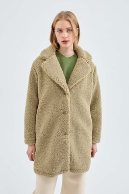 Short green sheepskin coat